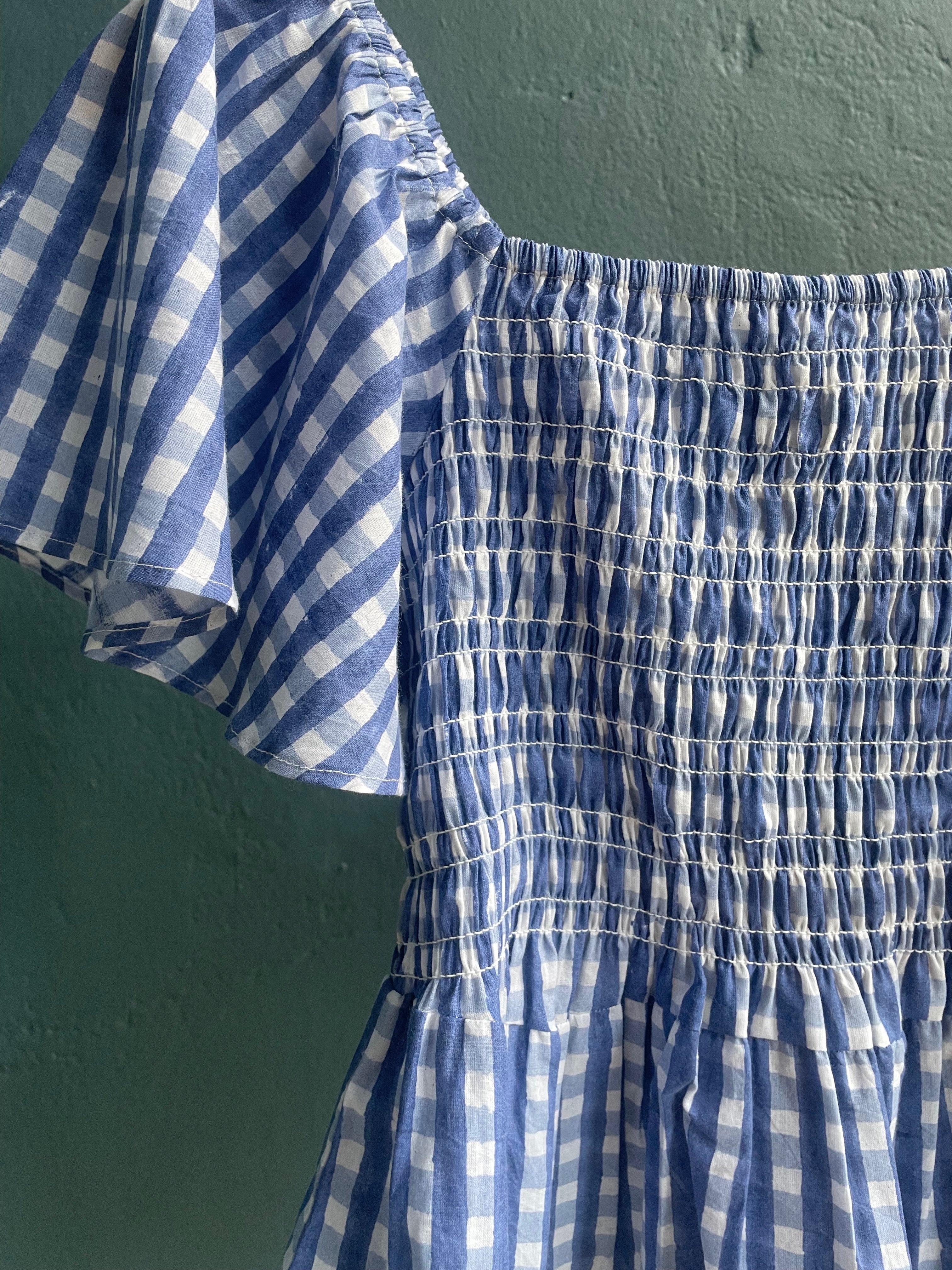 Hema Smocked Flutter Top in Gingham