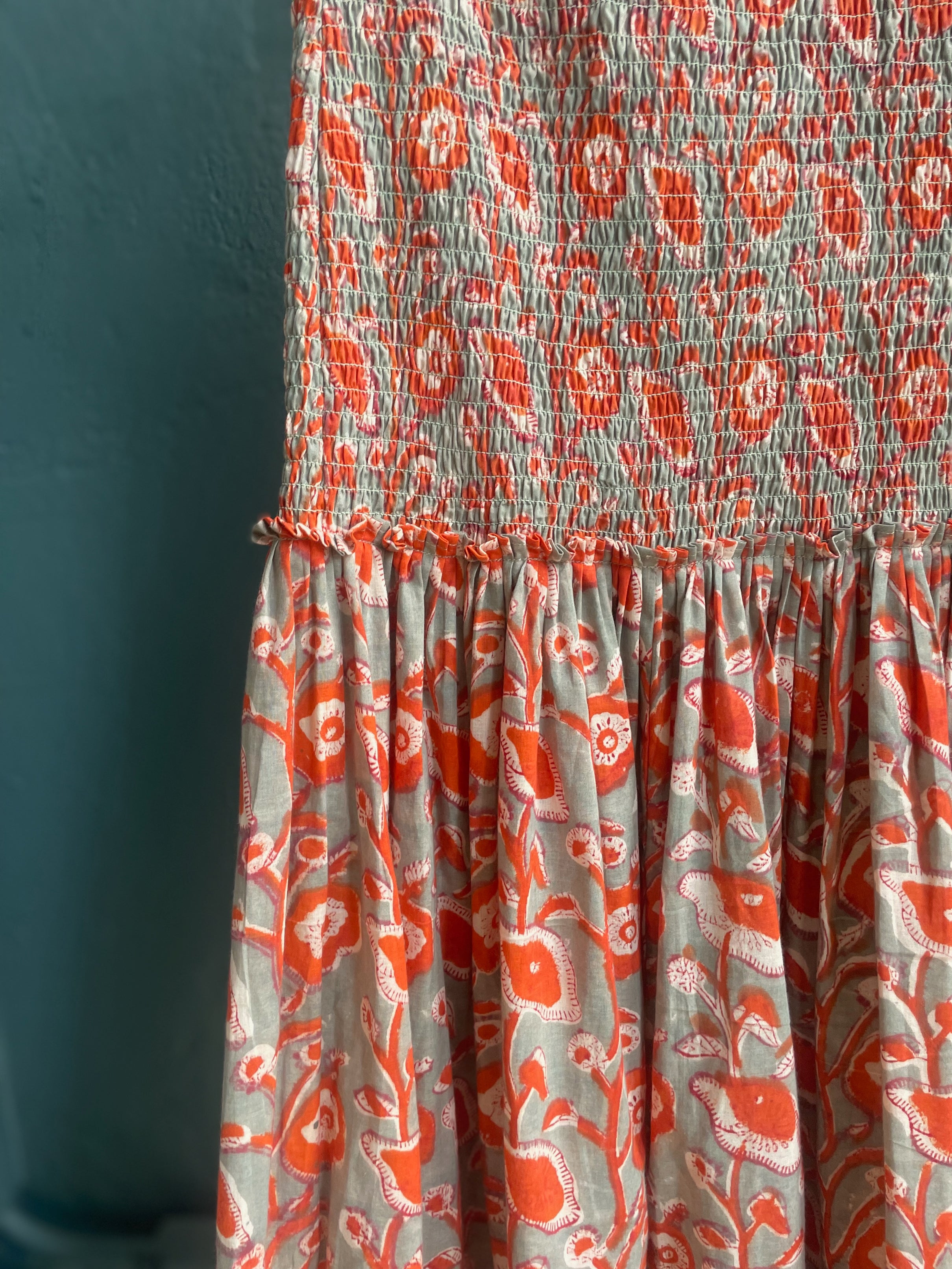 Nalini Smocked Midi Dress in Sage and Poppy
