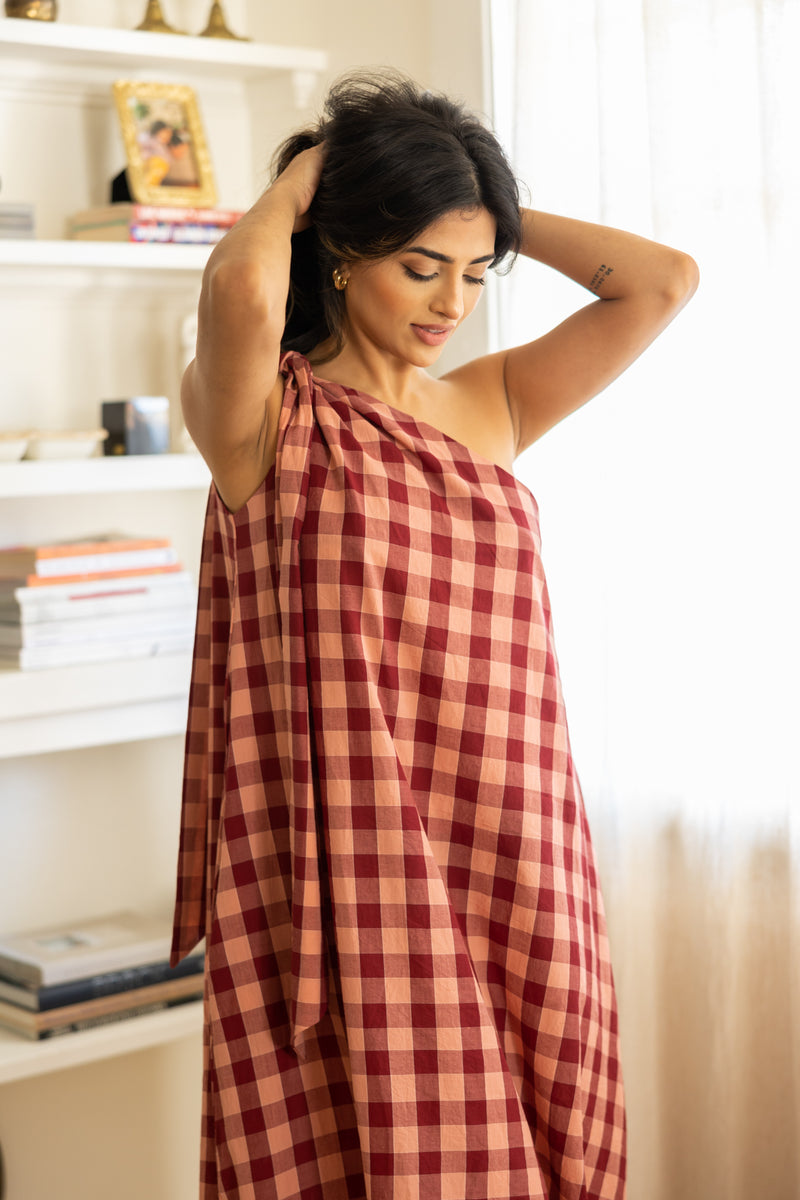Cotton gingham one-shoulder Anju dress with waist tie, handmade in India.  | berry gingham
