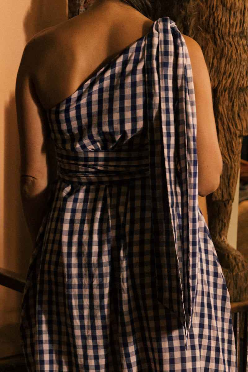 Cotton gingham one-shoulder Anju dress with waist tie, handmade in India.  | navy gingham