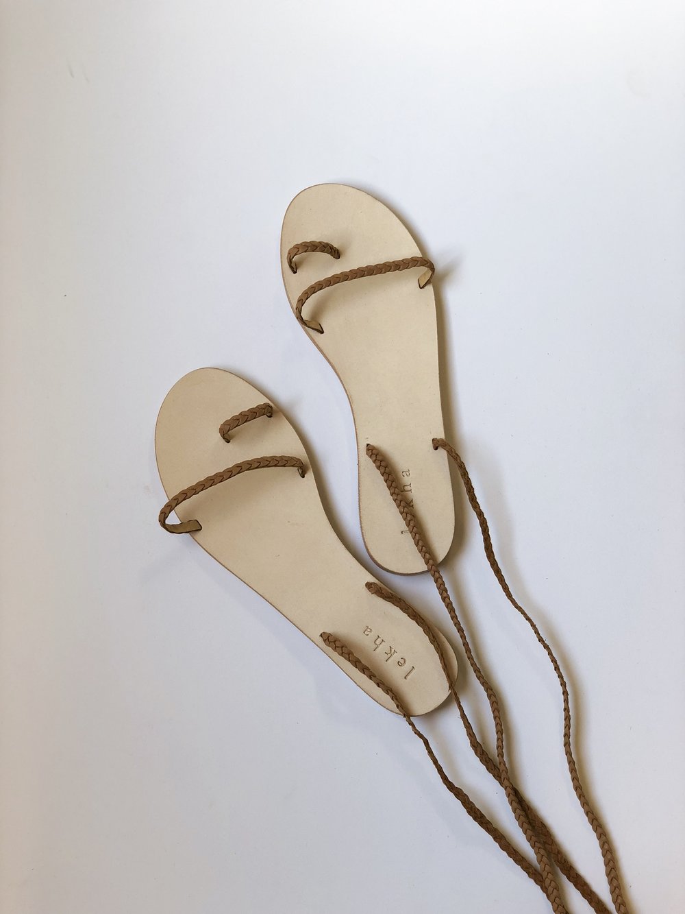Leather ankle-tie sandal, handmade by artisans in India.